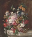 Roses, tulips, chrysanthemums, narcissae and other summers blooms in an urn by a bird's nest on a marble ledge - (after) Franz Xaver Petter