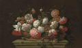Carnations, chrysanthemums, roses, a parrot tulip and other flowers in a basket on a ledge - (after) Pieter Hardime