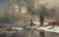 Windmills along a frozen waterway with a 