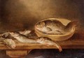A Still Life Of Fish On A Wooden Table - Alexander Adriaenssen