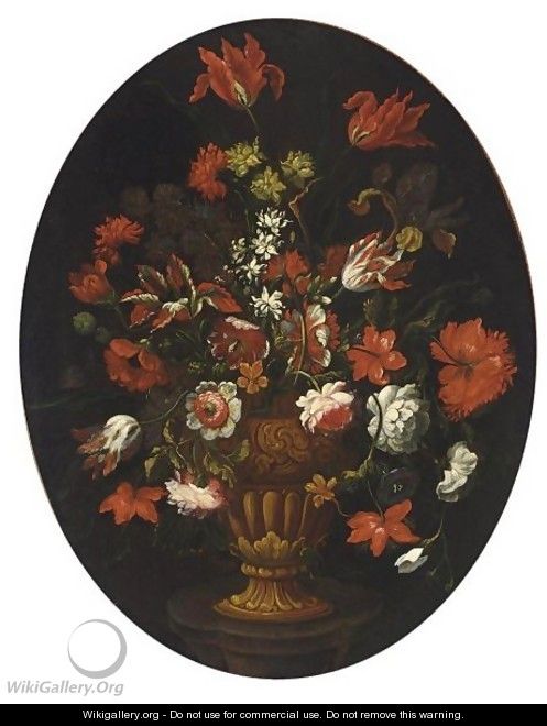 A Still Life With Tulips, Carnations, Roses And Other Flowers In A Vase On A Stone Table - North-Italian School