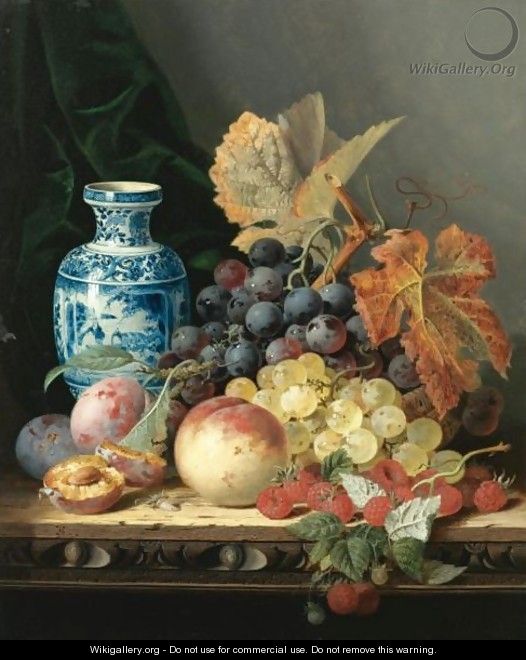 Still Life With A Chinese Vase, Grapes, Plums, Raspberries And A Peach On A Carved Wooden Tabletop - Edward Ladell
